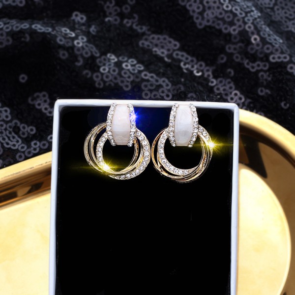 Сережки "Layered Rings", різні кольори