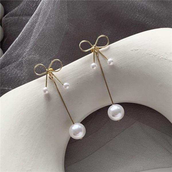 Сережки з перлами і бантиком "Pearl Bow"