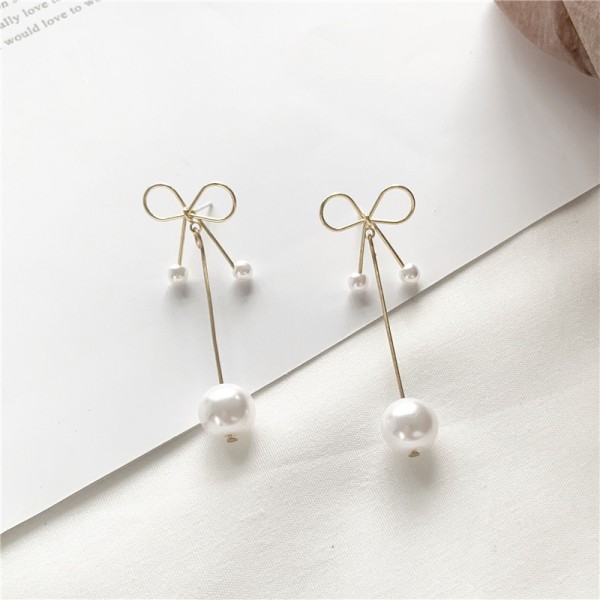 Сережки з перлами і бантиком "Pearl Bow"