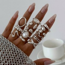 Набір стильних каблучок з ефектом розплавленої лави "Silver Rings", трендові жіночі кільця, срібло, 12 шт