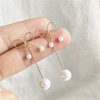 Сережки з перлами і бантиком "Pearl Bow"