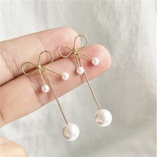 Сережки з перлами і бантиком "Pearl Bow"