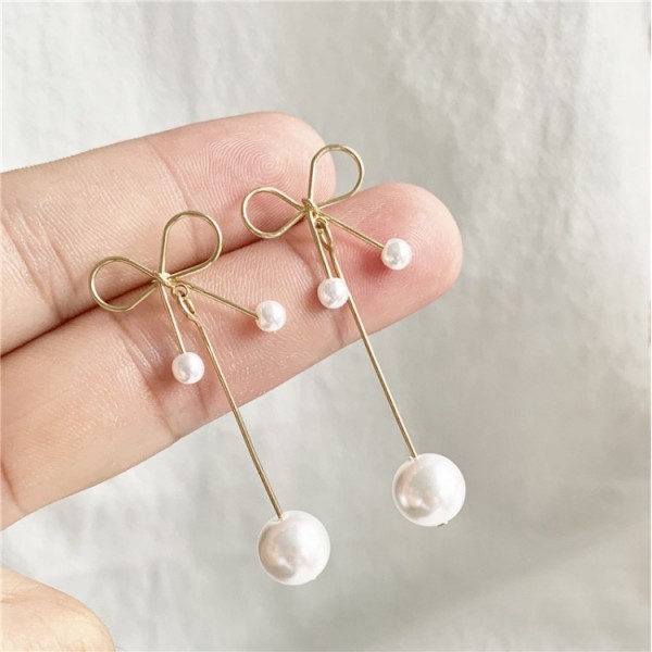 Сережки з перлами і бантиком "Pearl Bow"