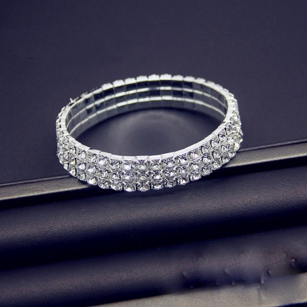 Браслет-резинка зі стразами у 3 ряди, "Three Row of Stones", срібло-золото