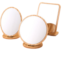 Дзеркало косметичне на дерев`яній підставці, різні форми