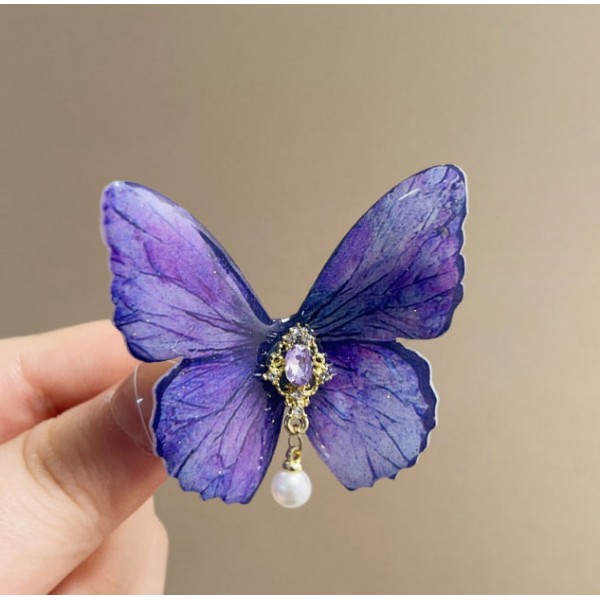 Заколка для волосся "Сяючий метелик" різні кольори Заколка для волосся "Сяючий метелик" різні кольори