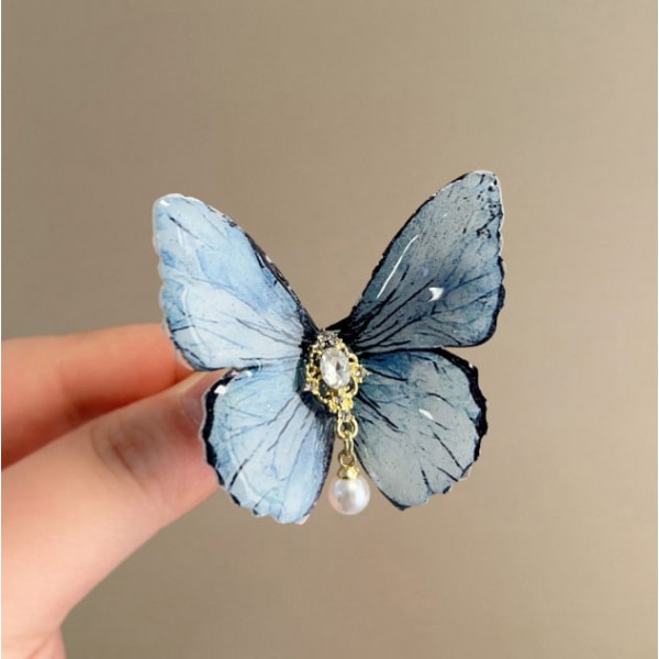 Заколка для волосся "Сяючий метелик" різні кольори Заколка для волосся "Сяючий метелик" різні кольори