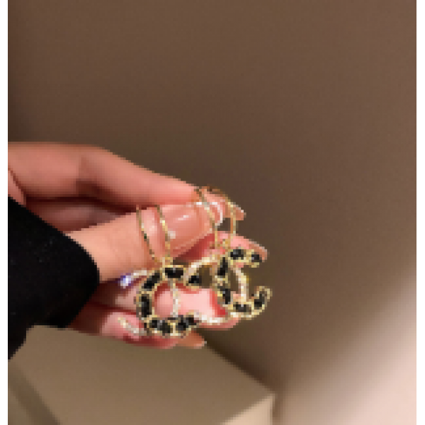 Сережки зі стразами та золотим плетенням, золото